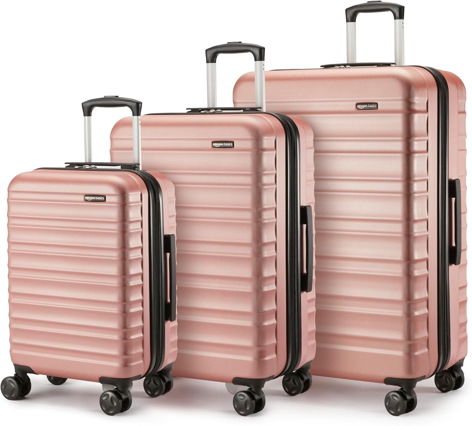 Amazon Basics - Mala de viagem rígida giratória, Or rosa, Conjunto de 3 unidades