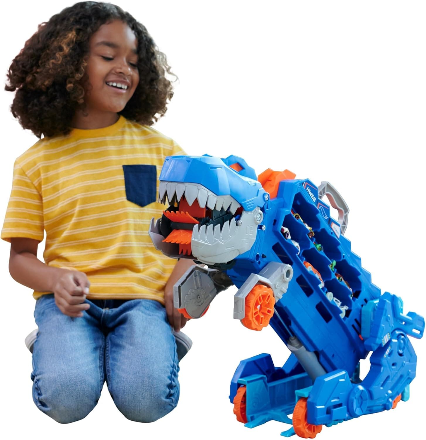 Hot Wheels City "Let's Race - a correr!" Netflix Camião T-Rex definitivo dinossauro transporte e pista para carros de brinquedo, inclui 2 veículos, + 4 anos (Mattel HNG50)