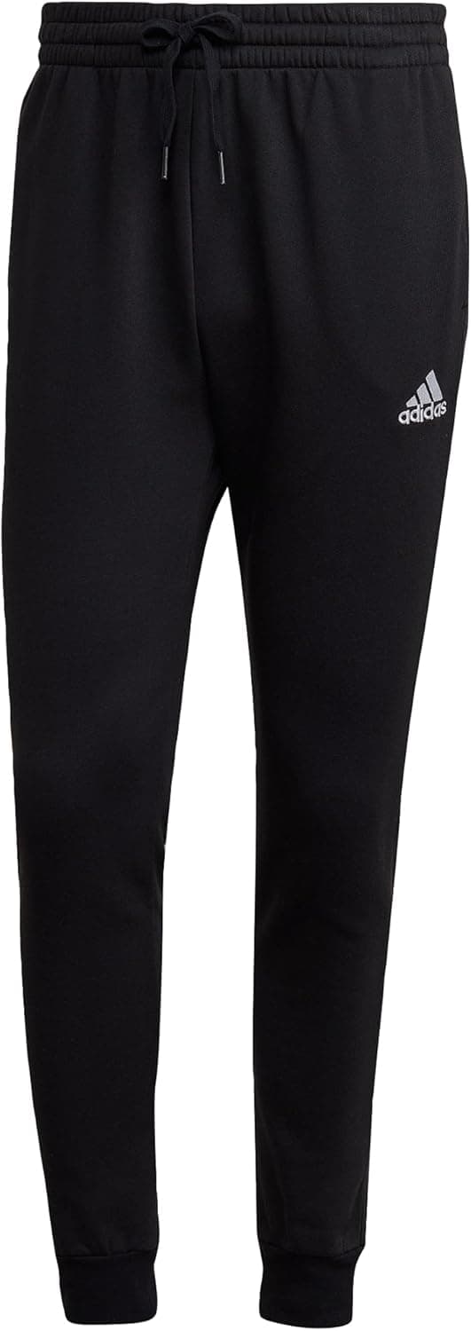 adidas Essentials Fleece Regular Tapered | Calças desportivas em algodão com corte afunilado e cintura elástica para homem