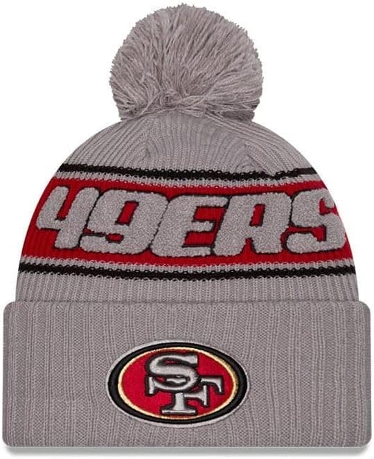 New Era NFL Boné com pompom Sideline 2024 futebol americano logótipo da equipa Beanie gorro de inverno cinzento